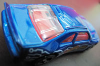 blue hotwheels dot com car